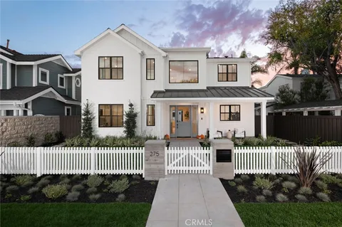 a house view with a garden space