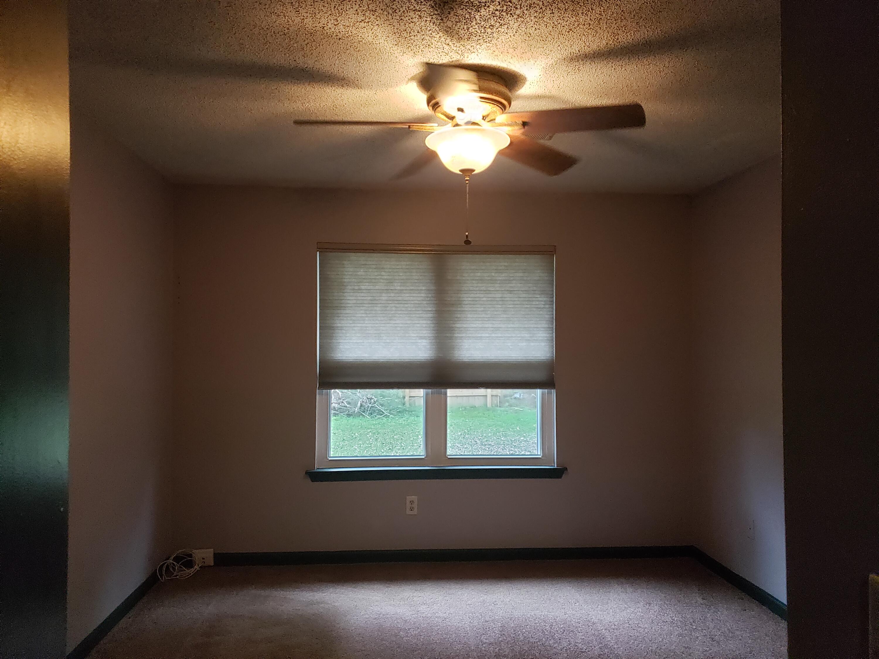 1015 Douglas Wayne Road Summerville, SC 29486 - Photo 14 of 24 Master bedroom has a ceiling fan.