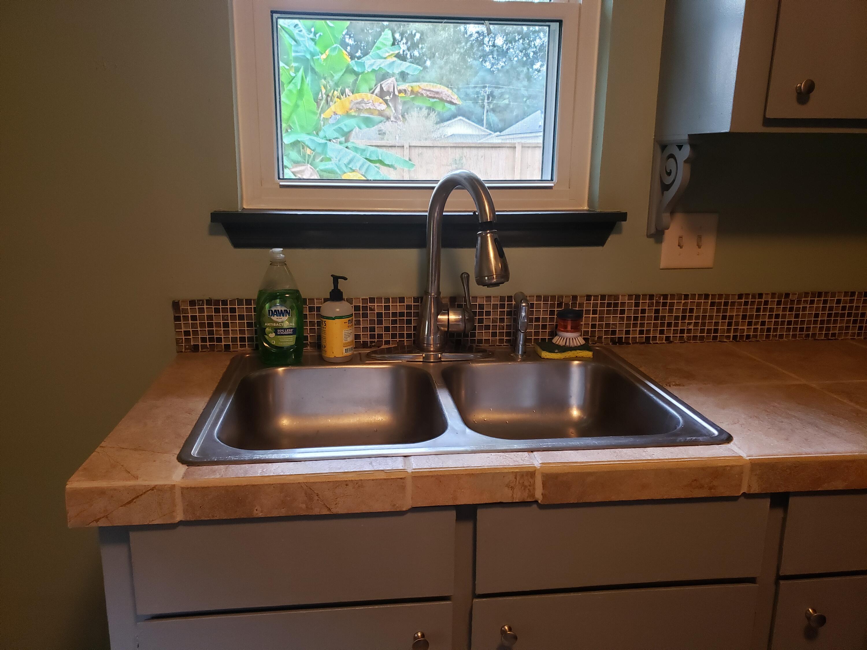 1015 Douglas Wayne Road Summerville, SC 29486 - Photo 8 of 24 Kitchen sink looks into backyard.