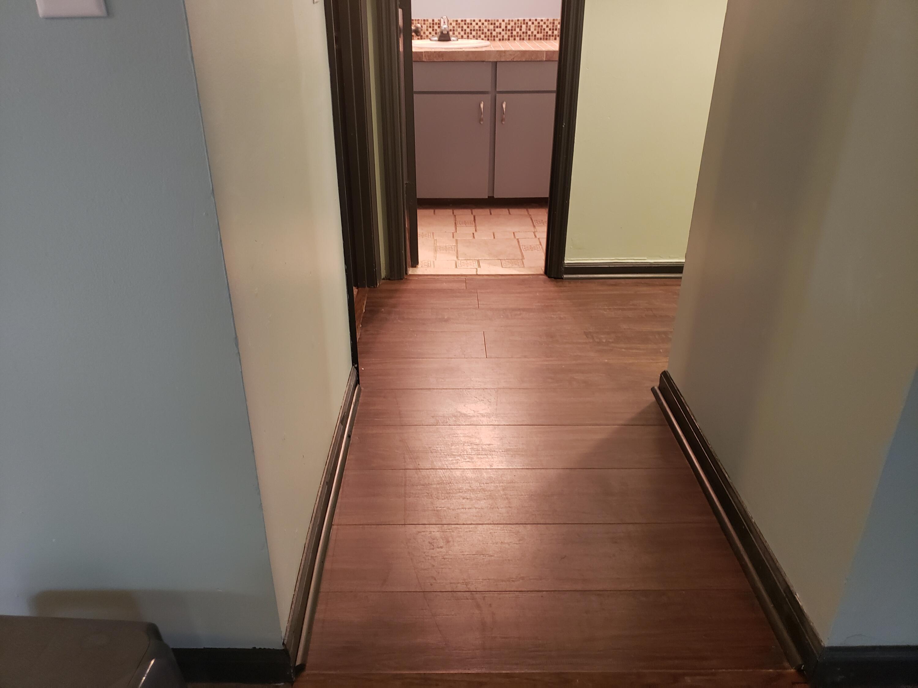 1015 Douglas Wayne Road Summerville, SC 29486 - Photo 10 of 24 New floor in hallway.