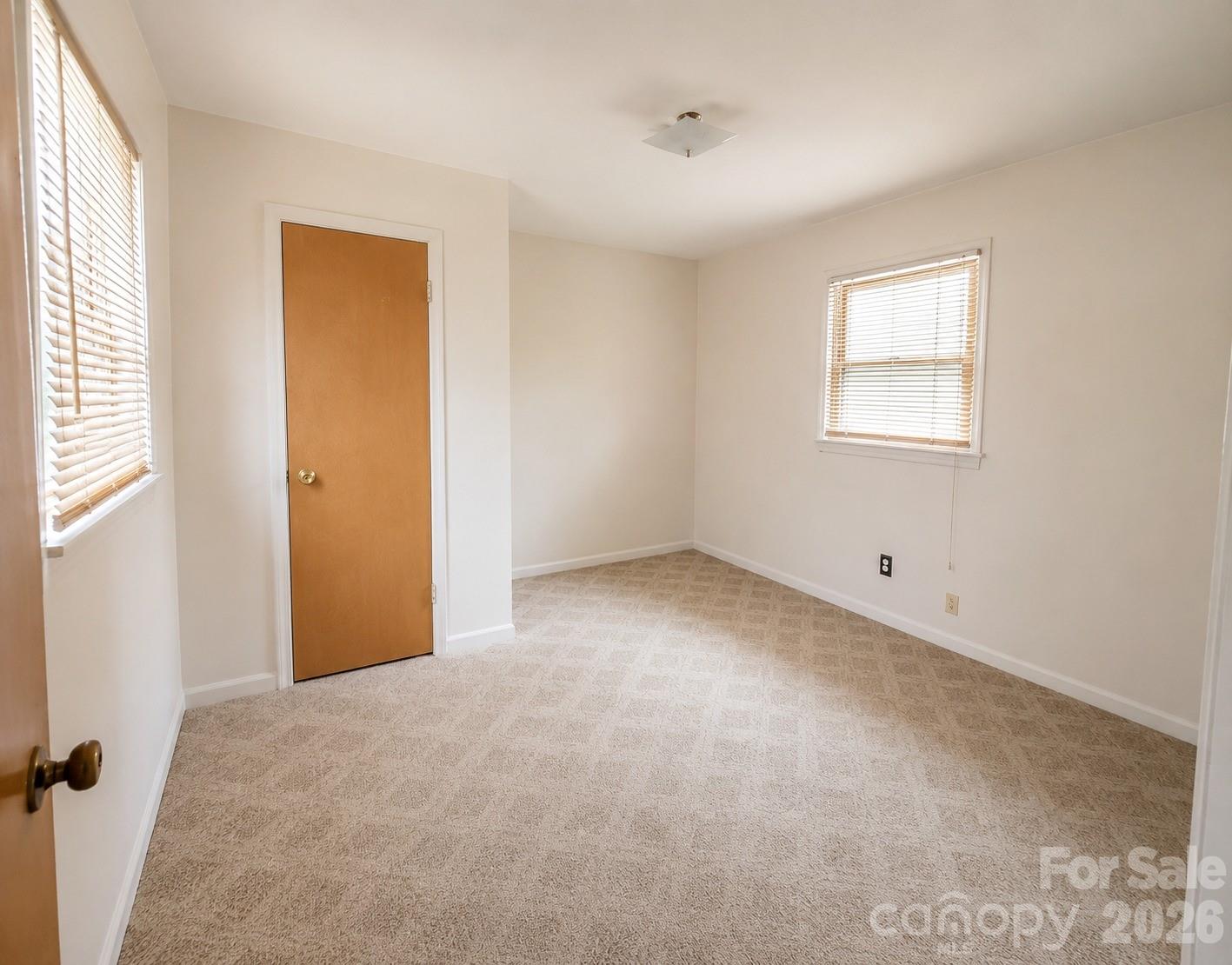 405 Isom Street Lancaster, SC 29720 - Photo 7 of 8 a view of an empty room with a window