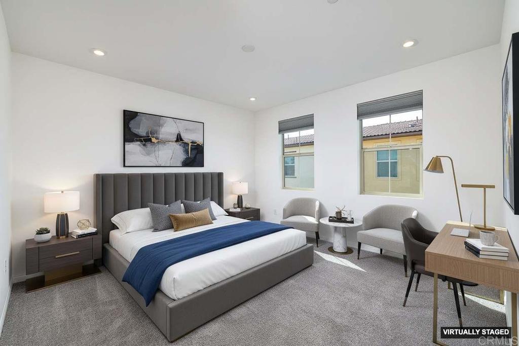 1622 Fig Tree Way Oceanside, CA 92056 - Photo 24 of 48 a bedroom with a bed and wooden floor