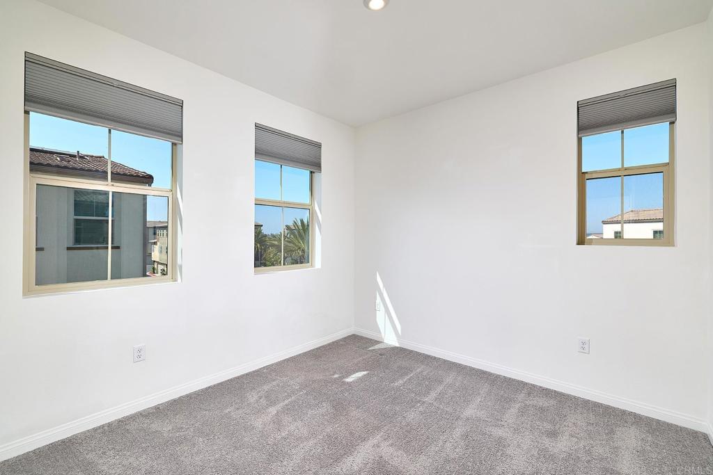 1622 Fig Tree Way Oceanside, CA 92056 - Photo 29 of 48 an empty room with a window
