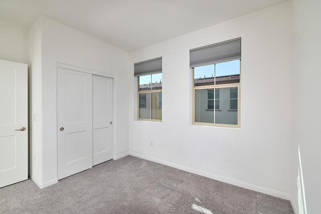 1622 Fig Tree Way Oceanside, CA 92056 - Photo 30 of 48 a view of an empty room with a window