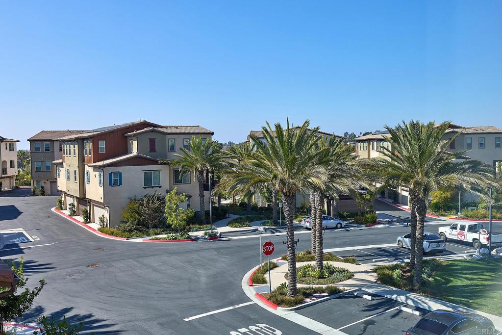 1622 Fig Tree Way Oceanside, CA 92056 - Photo 33 of 48 a view of a street with a building in the background