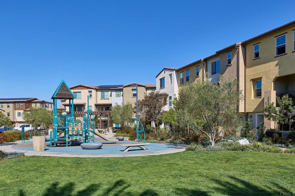 1622 Fig Tree Way Oceanside, CA 92056 - Photo 36 of 48 a front view of a house with a yard