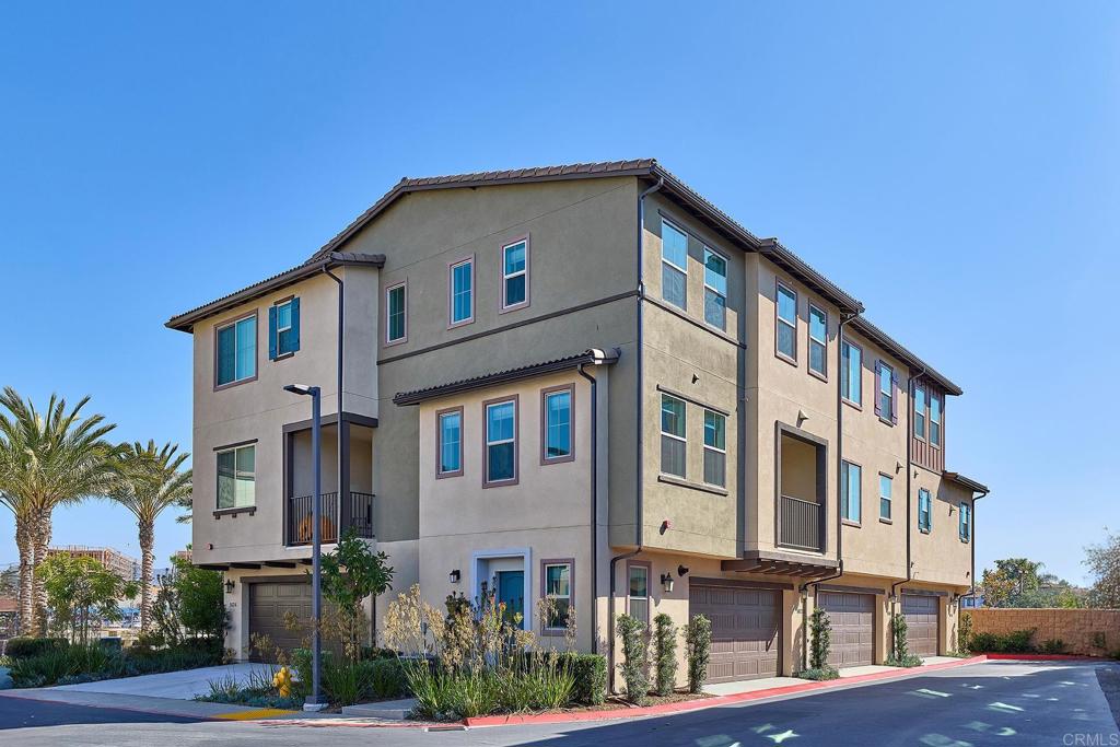 1622 Fig Tree Way Oceanside, CA 92056 - Photo 4 of 48 a view of a building with a street