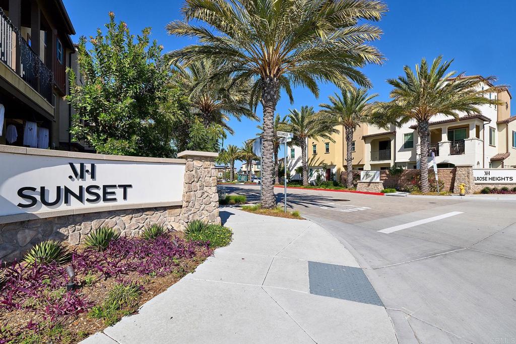 1622 Fig Tree Way Oceanside, CA 92056 - Photo 48 of 48 a sign that is sitting in front of flowers