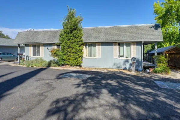 a kitchen with a refrigerator stove and microwave