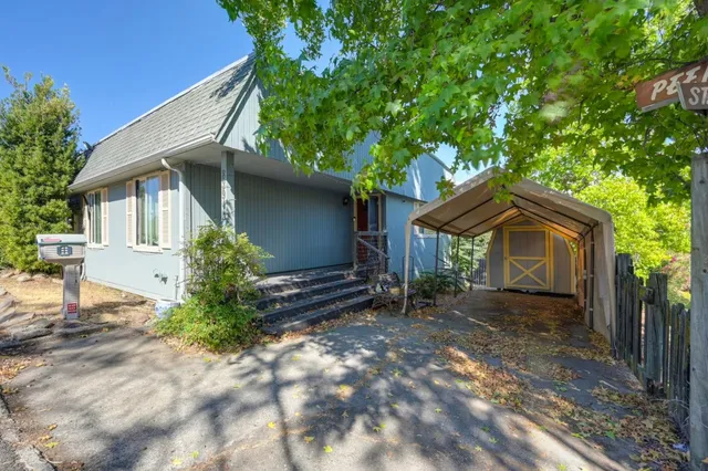 a house with trees in front of it