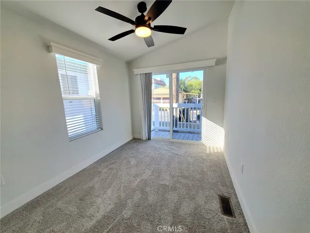 a view of livingroom with furniture and a ceiling fan