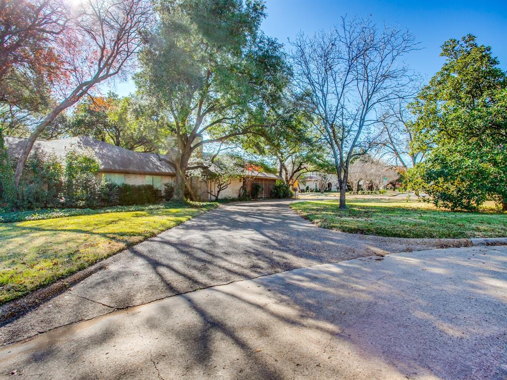a view of swimming pool with tree s