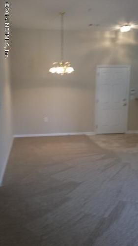 7920 Merrill Road, Unit 1407 Jacksonville, FL 32277 - Photo 4 of 7 a view of an empty room