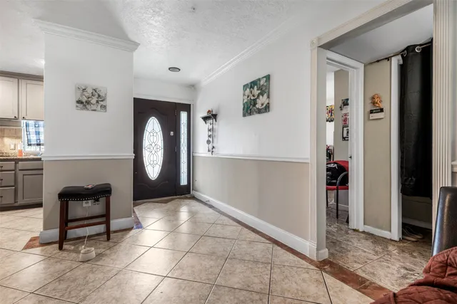 a view of livingroom with furniture and workspace