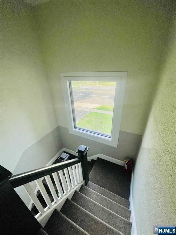 229 Orient Way, Unit 3 Rutherford, NJ 07070 - Photo 22 of 22 a view of a hallway with stairs