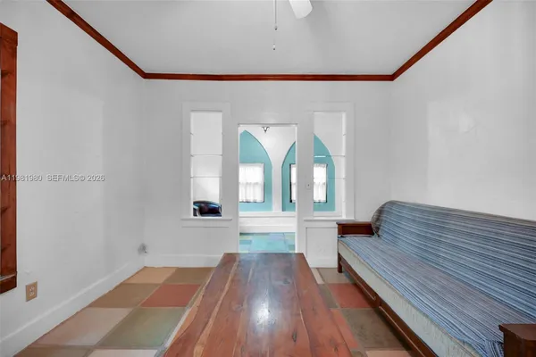 a living room with furniture and a window