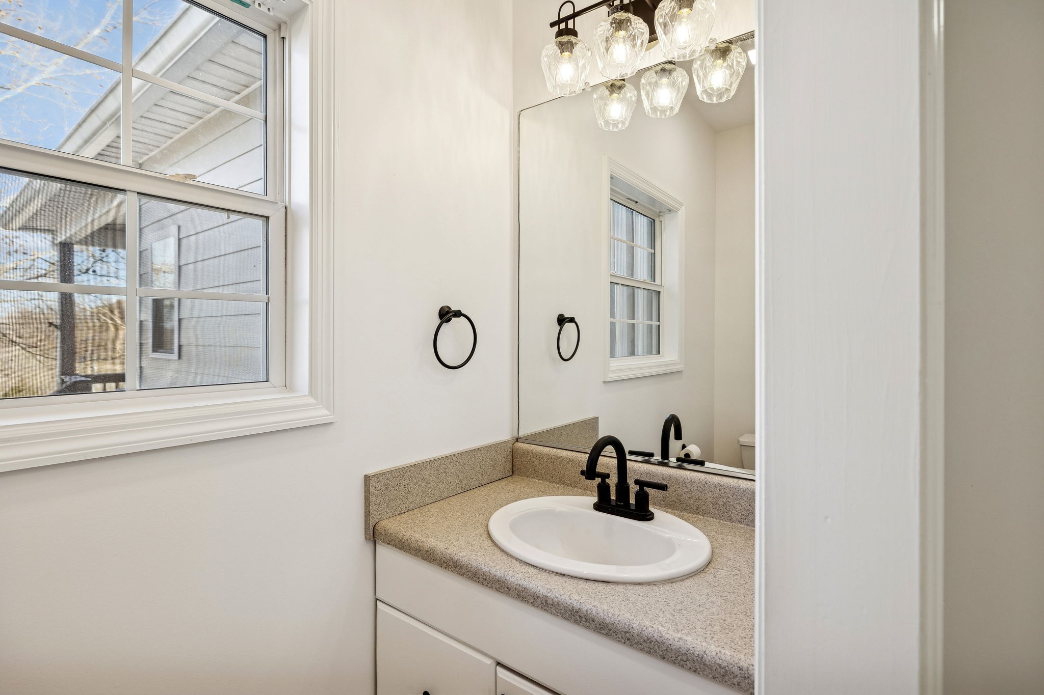 1909 Evergreen Road Thompson's Station, TN 37179 - Photo 26 of 75 a bathroom with a sink and a mirror