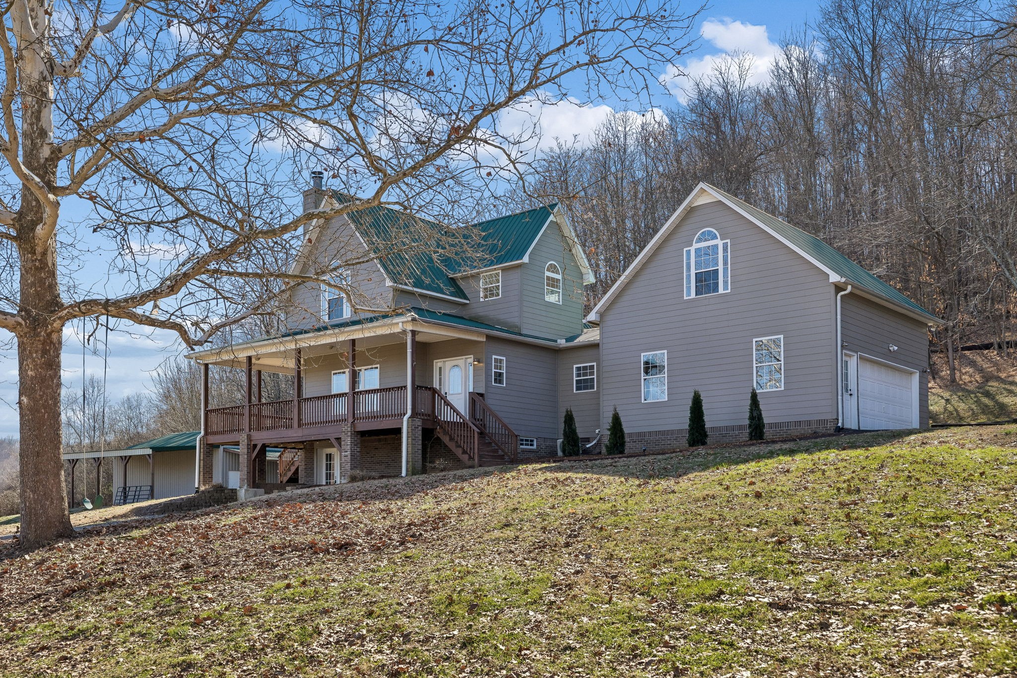 1909 Evergreen Road Thompson's Station, TN 37179 - Photo 5 of 75 a front view of a house with a yard