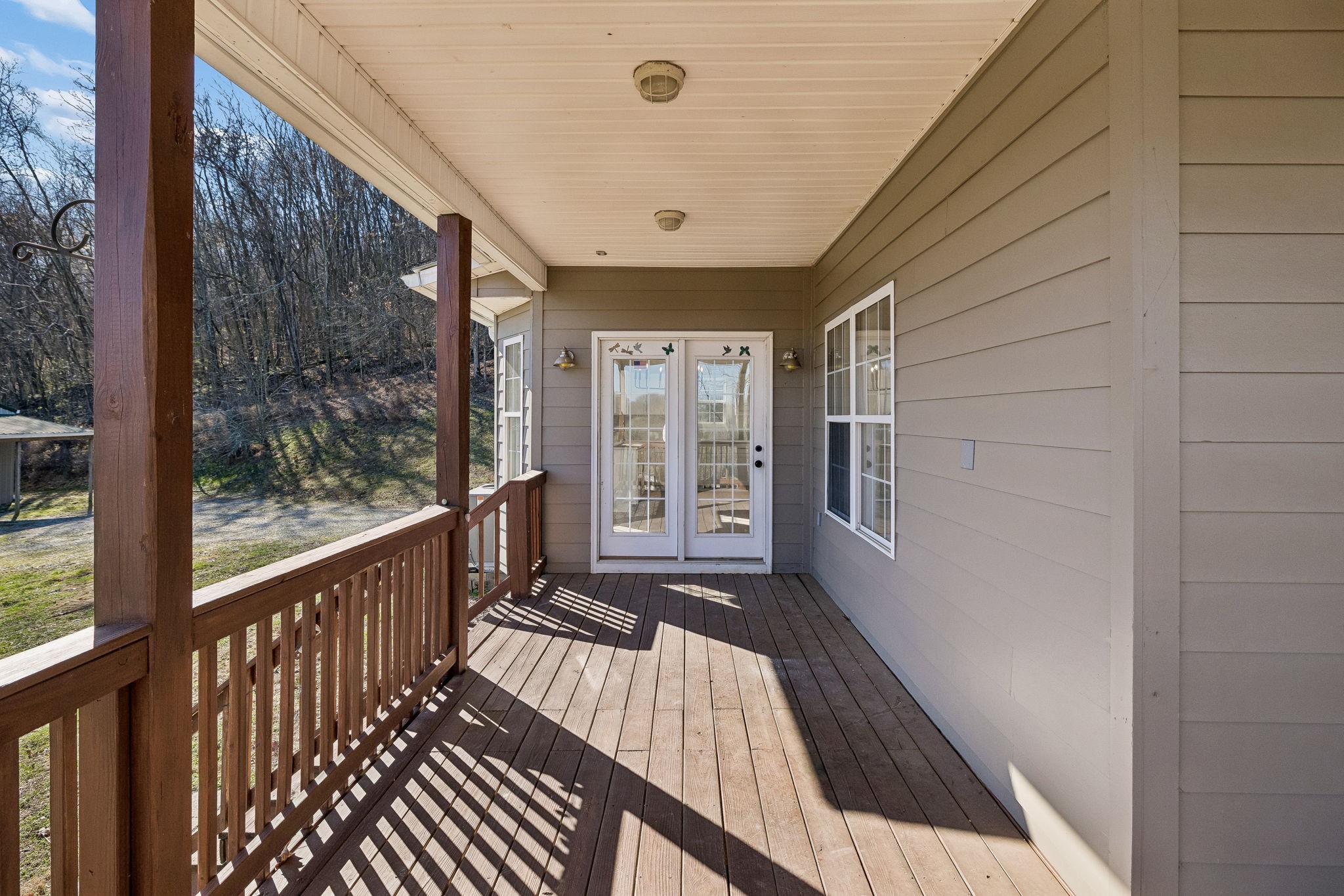 1909 Evergreen Road Thompson's Station, TN 37179 - Photo 57 of 75 a view of a balcony with wooden floor