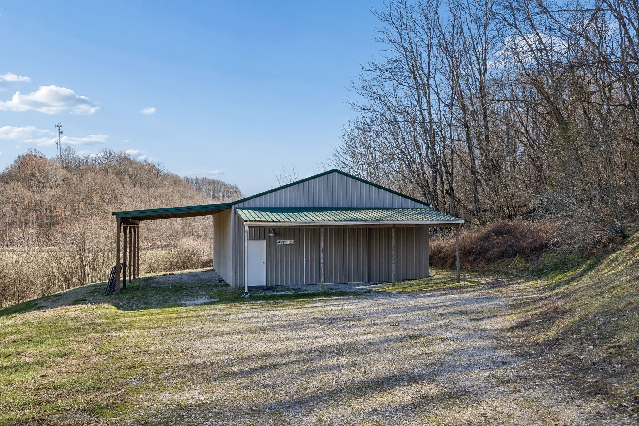 1909 Evergreen Road Thompson's Station, TN 37179 - Photo 60 of 75 a front view of a house with a yard and garage