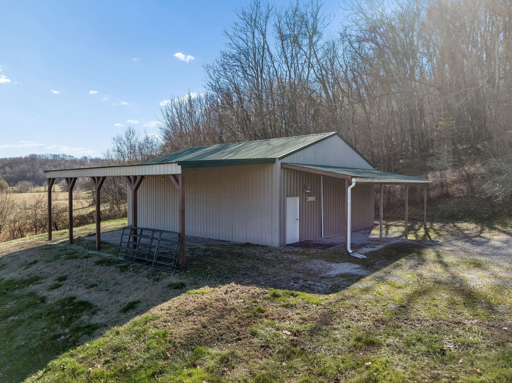 1909 Evergreen Road Thompson's Station, TN 37179 - Photo 65 of 75 a front view of a house with a yard and garage