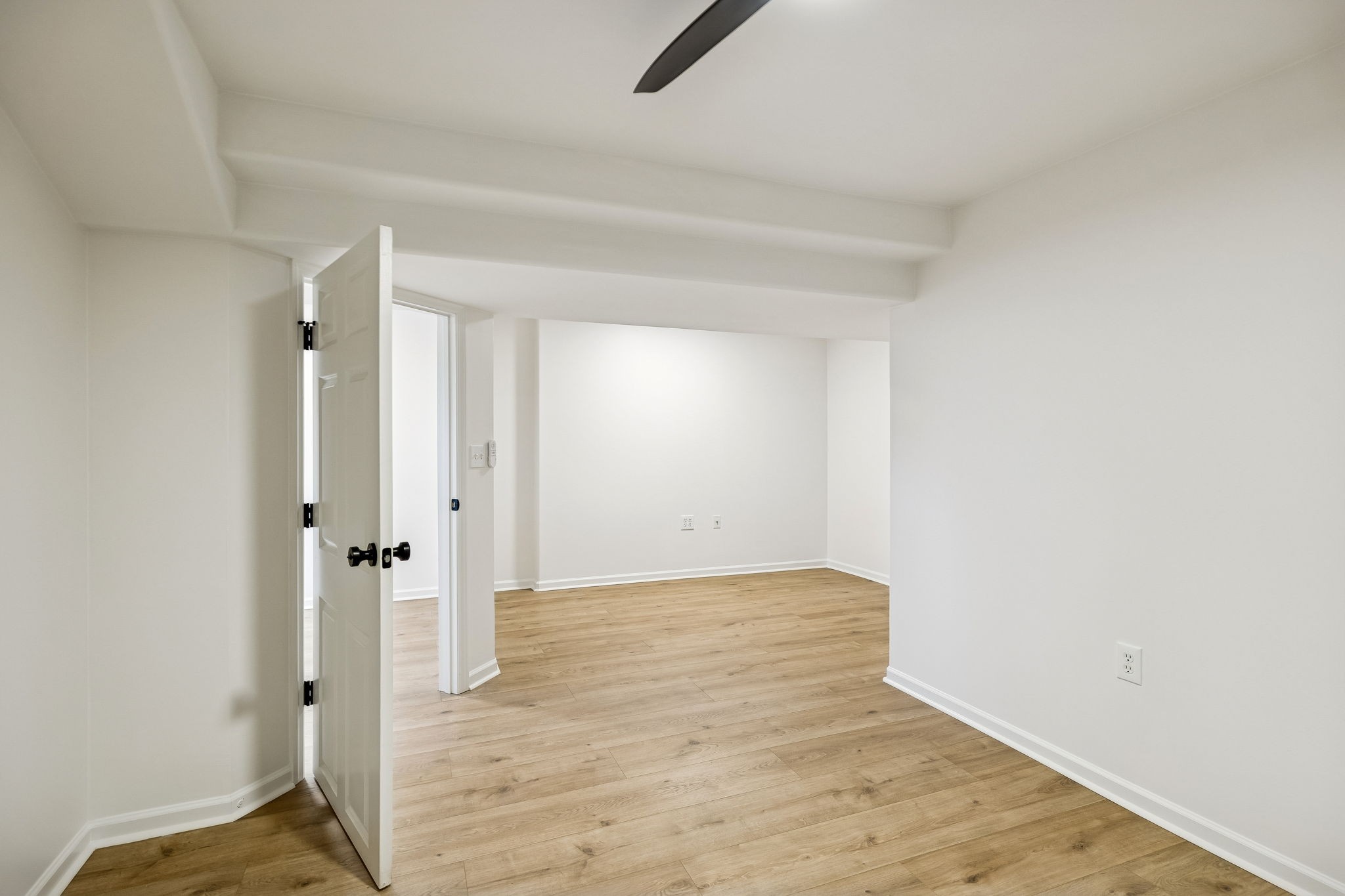 1909 Evergreen Road Thompson's Station, TN 37179 - Photo 8 of 75 an empty room with wooden floor and a window