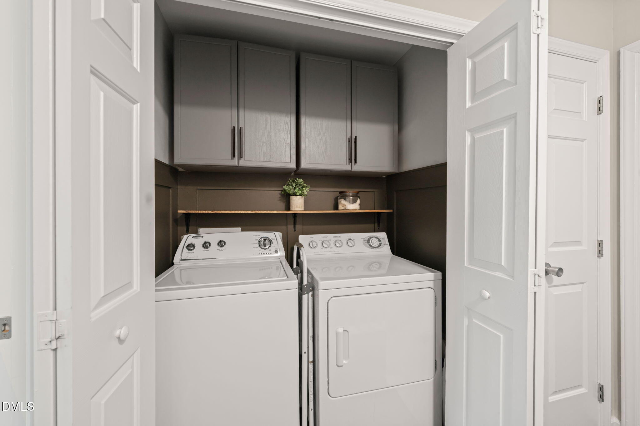 4323 Pine Springs Court Raleigh, NC 27613 - Photo 19 of 38 a utility room with dryer and washer