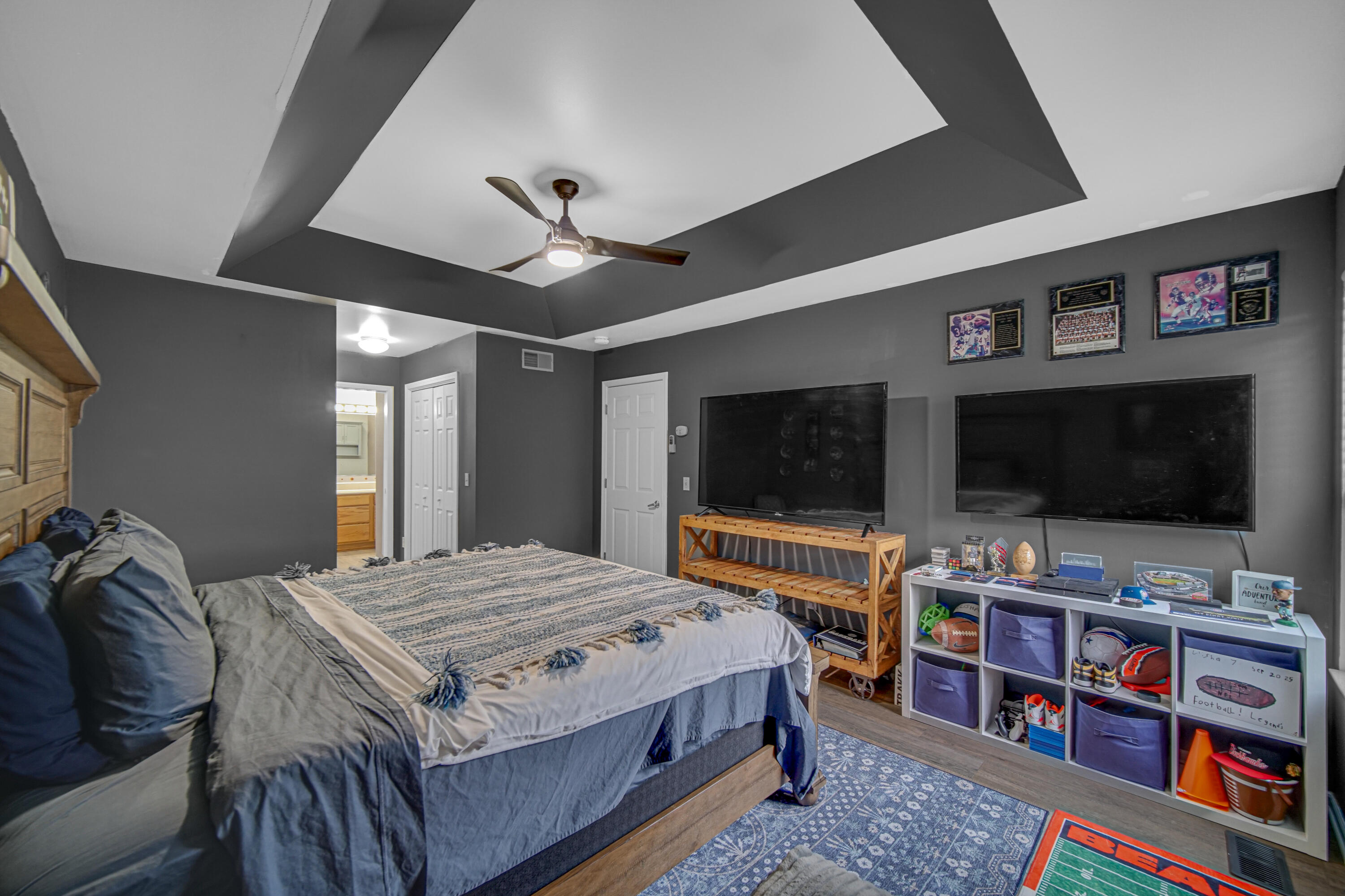 11130 Allendale Court Crown Point, IN 46307 - Photo 13 of 21 a bedroom with a bed and a flat screen tv