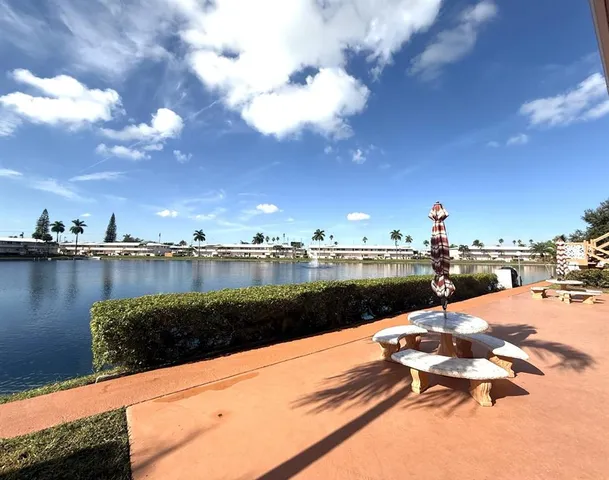 a view of swimming pool and lake