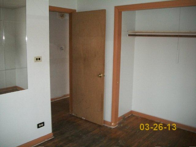 14300 Ridgeway Avenue Midlothian, IL 60445 - Photo 7 of 10 a view of a hallway with wooden floor