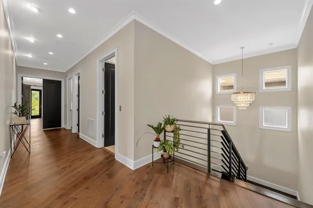 a bathroom with a glass shower door and a bathtub