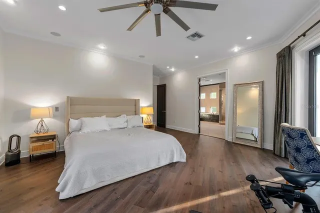 a bedroom with a bed and a dresser