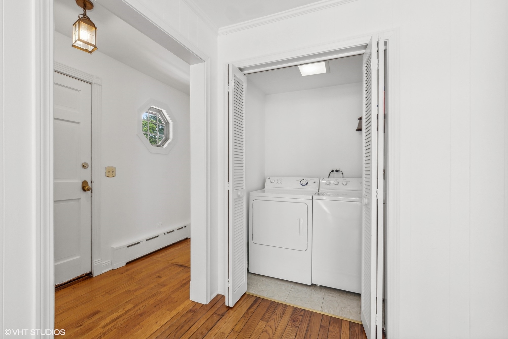 25 Washington Circle Lake Forest, IL 60045 - Photo 14 of 31 a view of a storage & utility room with wooden floor