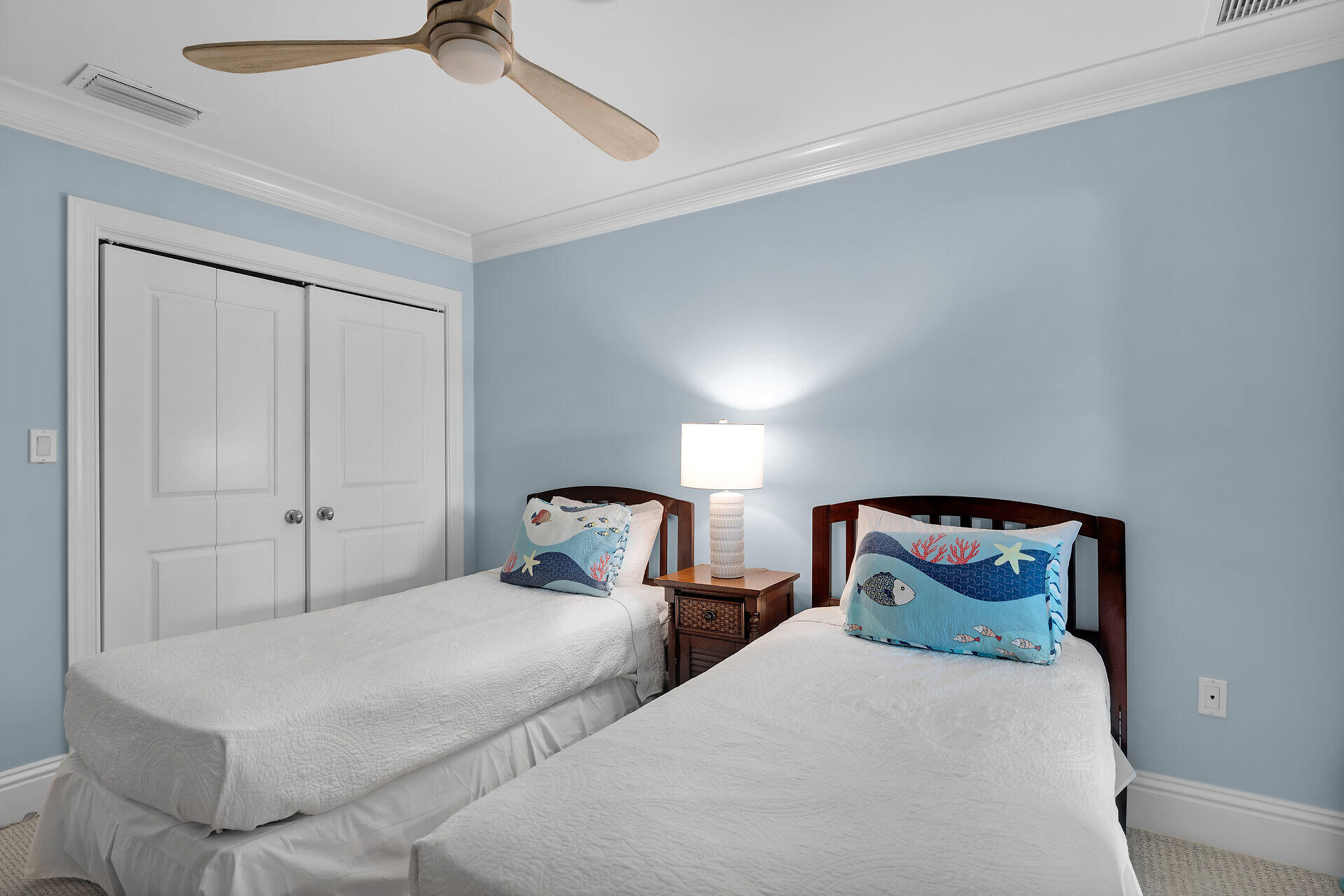 580-590 10th Street Key Colony Beach, FL 33051 - Photo 57 of 75 a bedroom with two beds and a chandelier