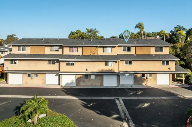 an aerial view of a city with lots of residential buildings