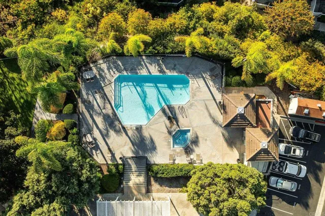 a view of a park with swings and slides