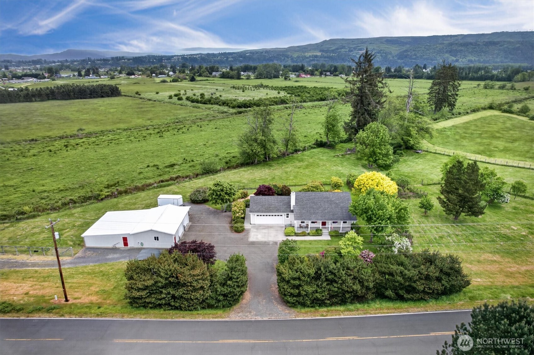 218 West Sunny Sands Road Cathlamet, WA 98612 - Photo 2 of 40 an aerial view of a house with a yard