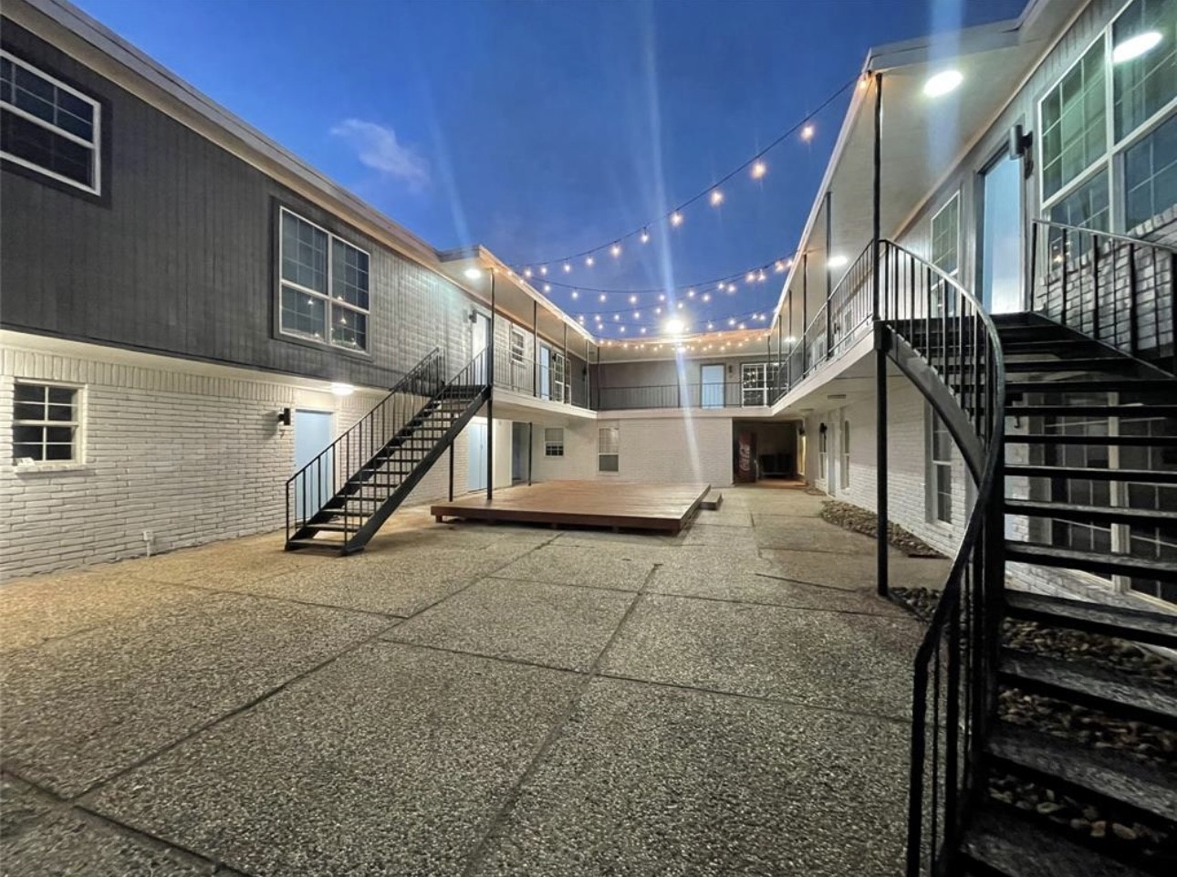 9711 Linkmeadow Lane, Unit 10 Houston, TX 77025 - Photo 23 of 27 a view of a hall with stairs