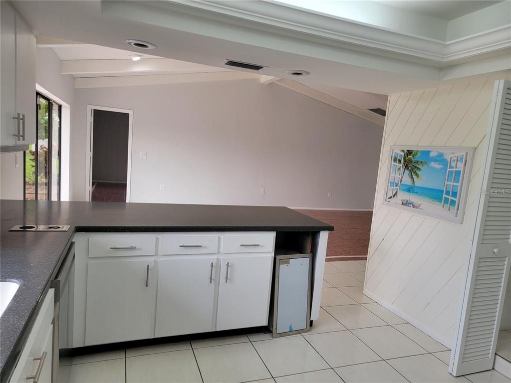26221 Constantine Road Punta Gorda, FL 33983 - Photo 3 of 27 a view of cabinets and wooden floor