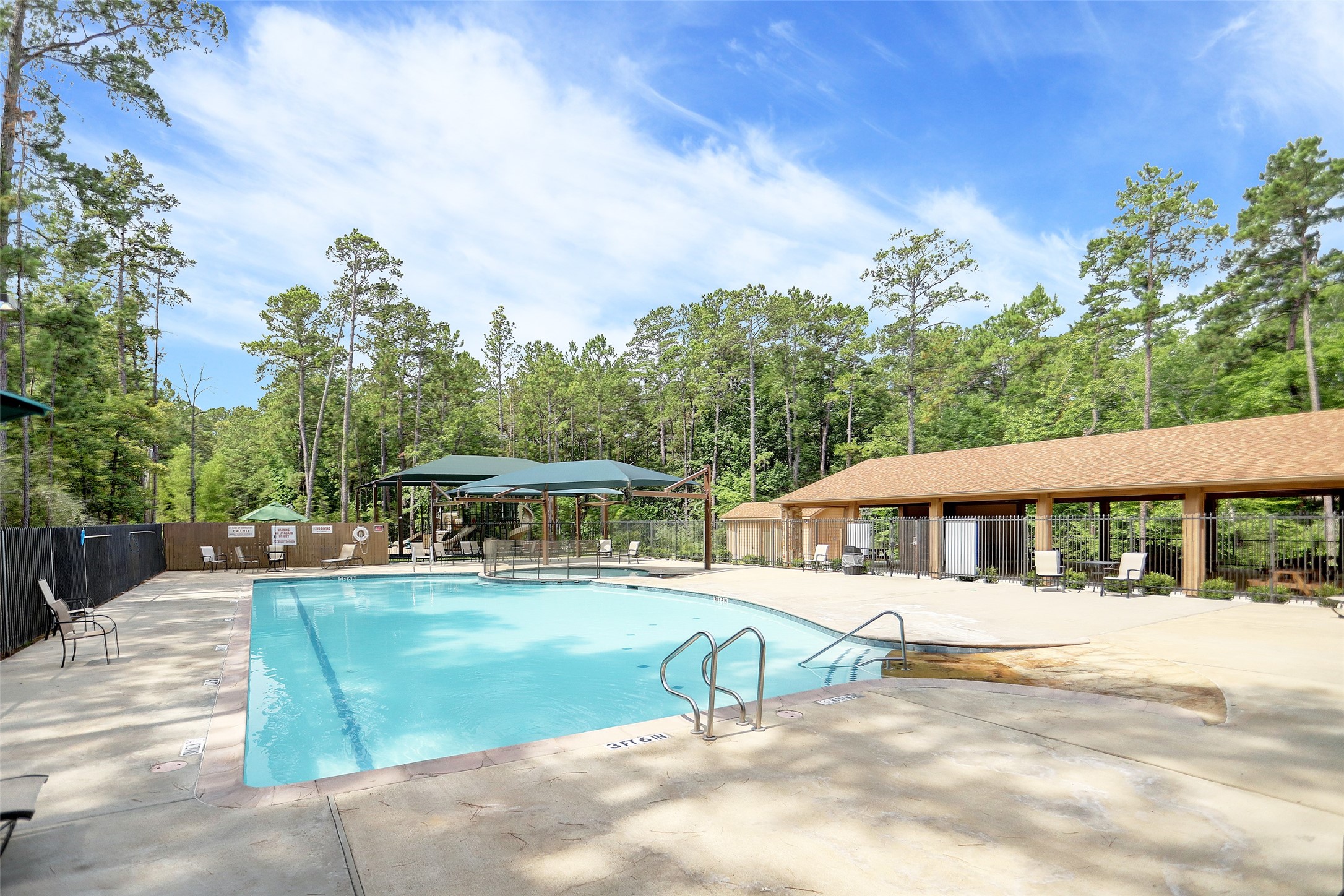 0 St Andrews Point Blank, TX 77364 - Photo 2 of 12 a view of a house with sitting area and a yard