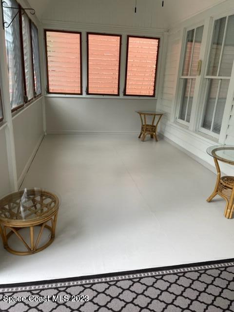 2206 Irwin Street Melbourne, FL 32901 - Photo 11 of 13 a view of wooden floor and chair in a room
