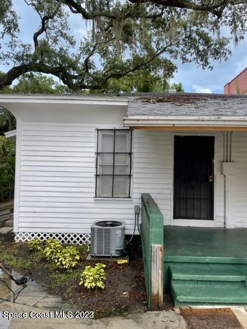 2206 Irwin Street Melbourne, FL 32901 - Photo 13 of 13 a front view of a house with a garden