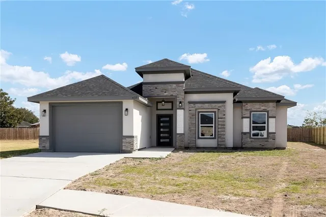 a house view with a outdoor space