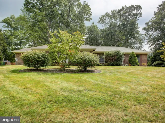 a front view of house with yard