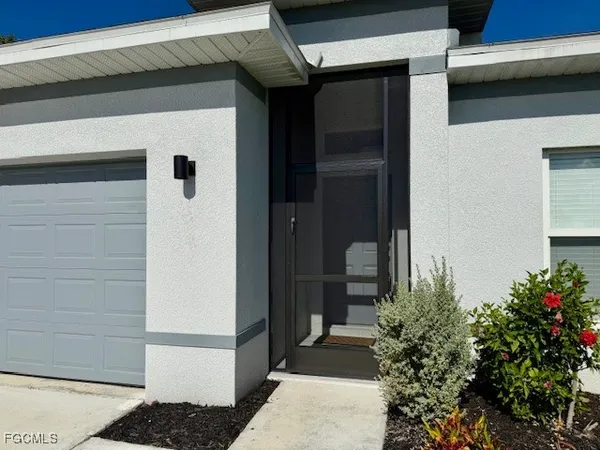 a view of a entryway door of house
