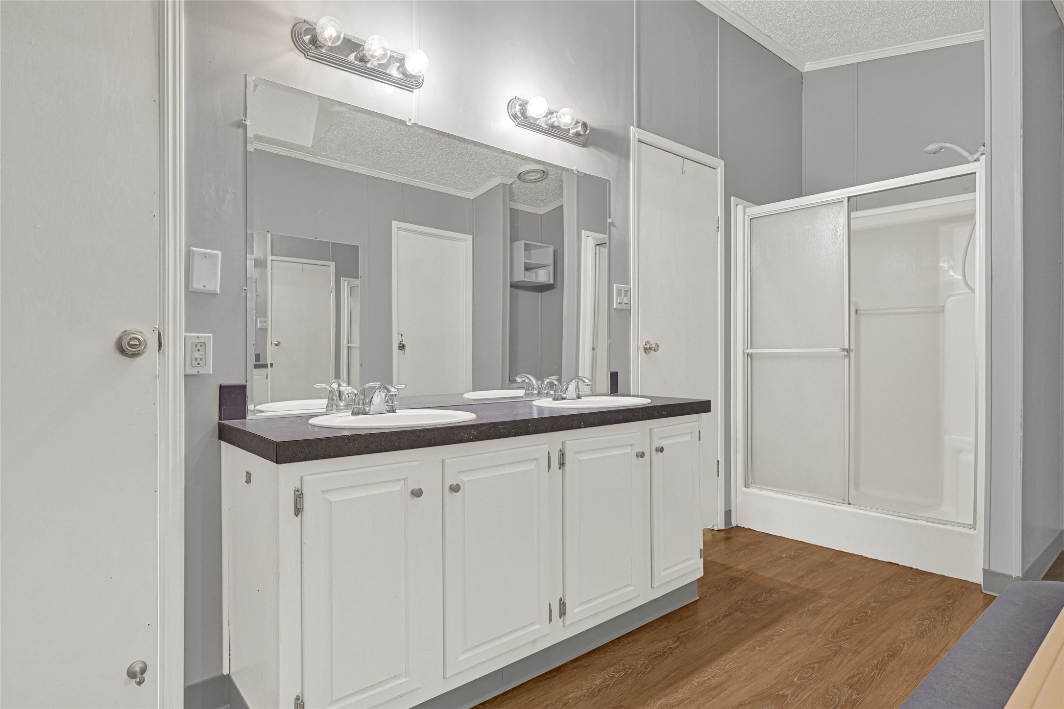 3725 Allen Road Pearland, TX 77584 - Photo 12 of 43 a bathroom with 2 sink and a mirror