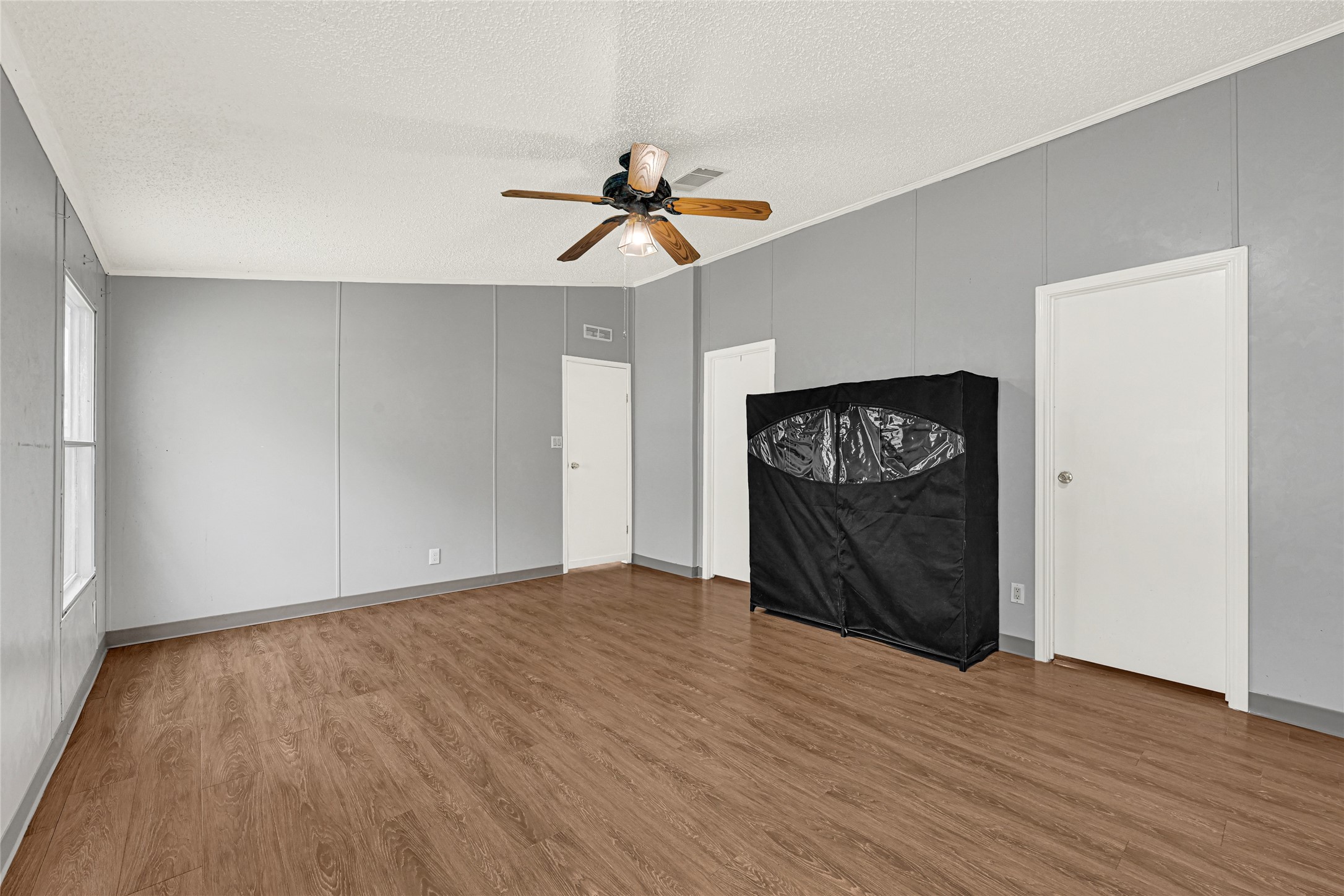 3725 Allen Road Pearland, TX 77584 - Photo 13 of 43 a view of an empty room and wooden floor