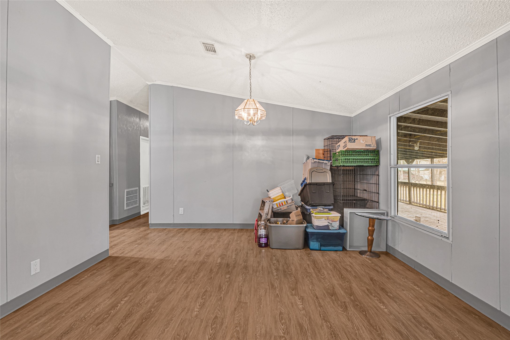 3725 Allen Road Pearland, TX 77584 - Photo 15 of 43 a view of empty room with wooden floor and fan