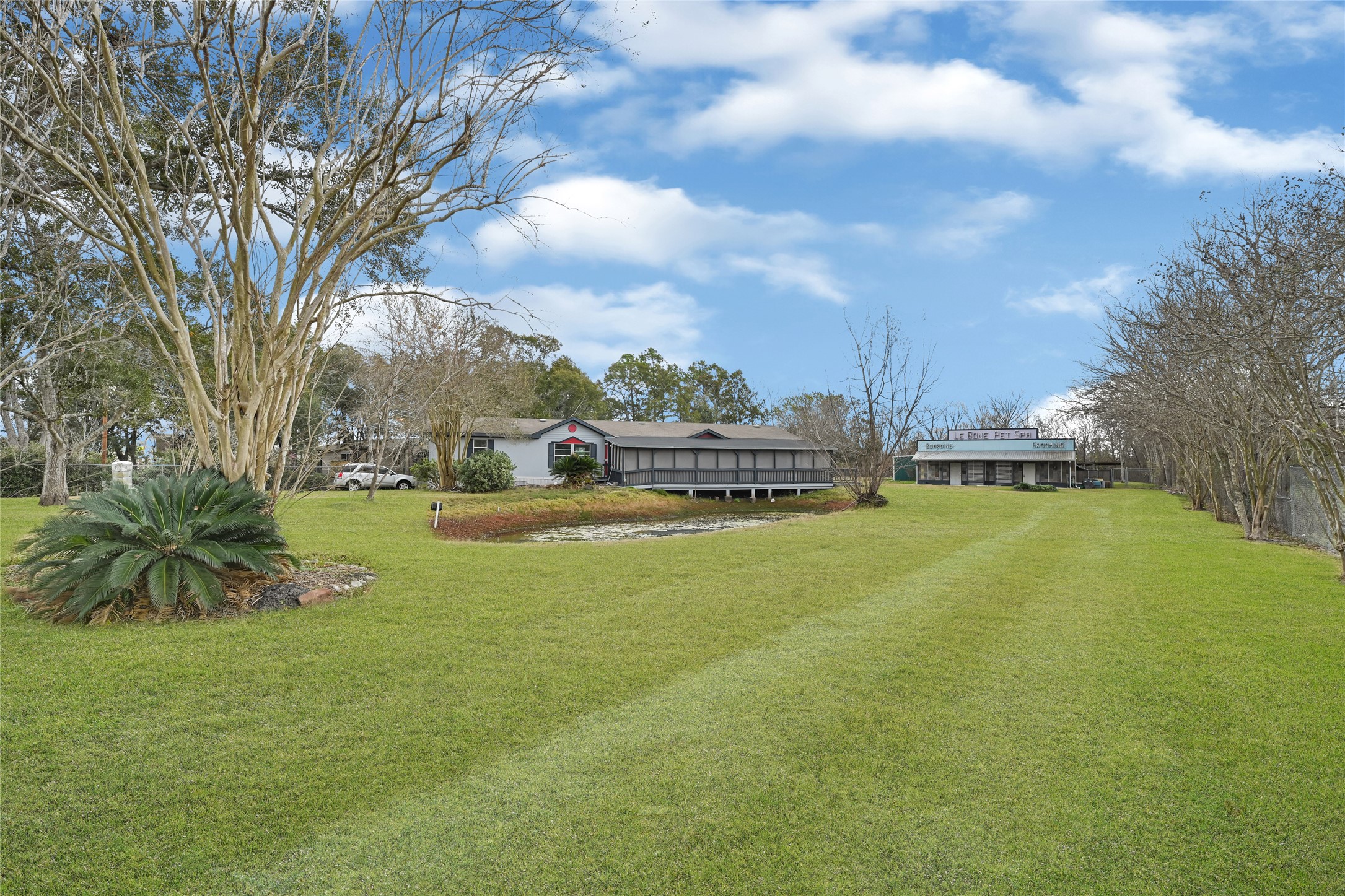 3725 Allen Road Pearland, TX 77584 - Photo 2 of 43 a view of swimming pool is middle in the garden