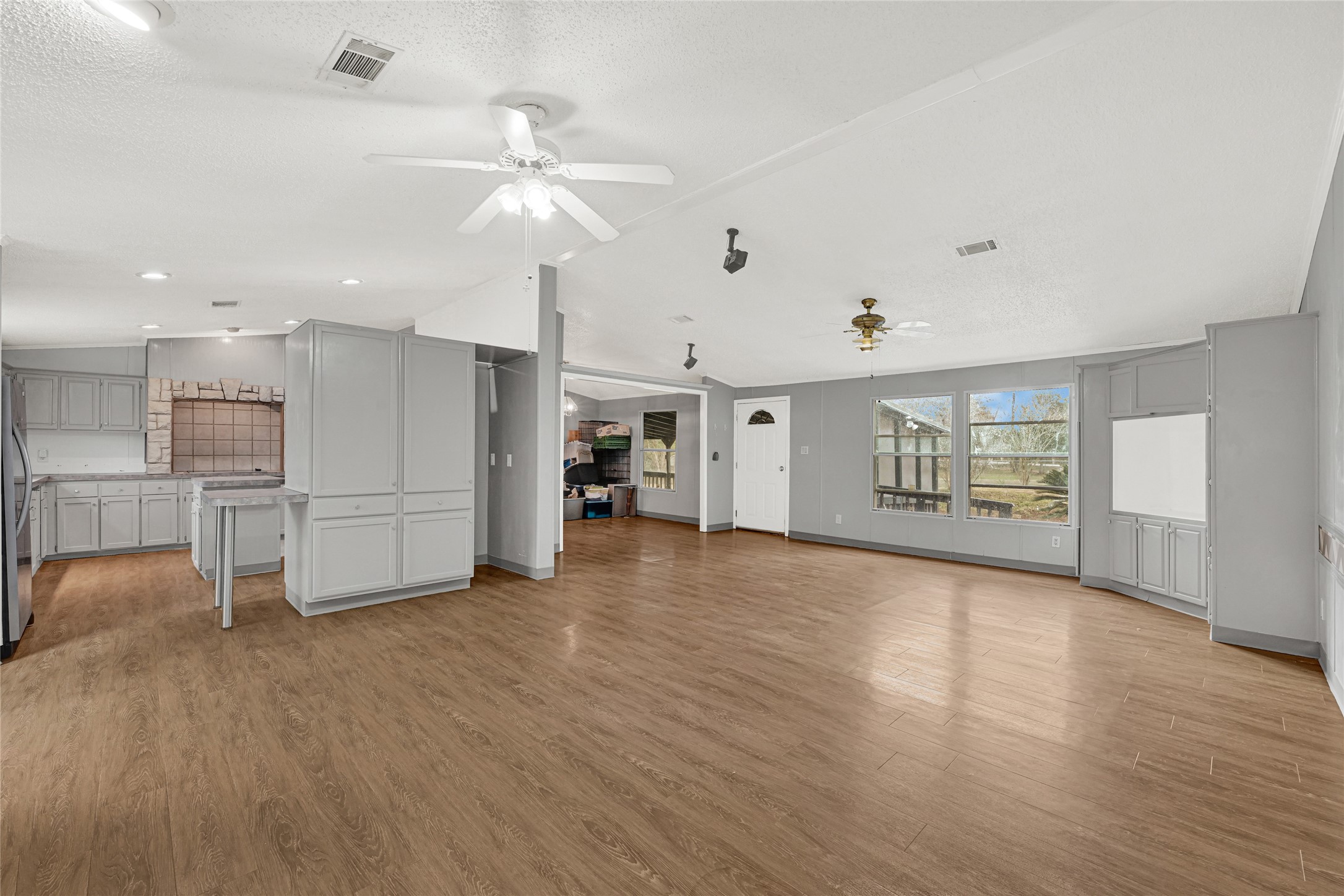 3725 Allen Road Pearland, TX 77584 - Photo 21 of 43 a view of an empty room with a window and fireplace